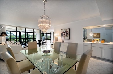 Beautifully renovated corner residence combining the comfort of on The Country Club At Boca Raton in Florida - for sale on GolfHomes.com, golf home, golf lot