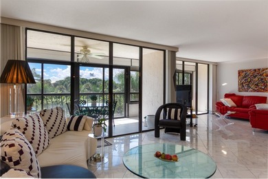 Beautifully renovated corner residence combining the comfort of on The Country Club At Boca Raton in Florida - for sale on GolfHomes.com, golf home, golf lot