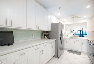 Beautifully renovated corner residence combining the comfort of on The Country Club At Boca Raton in Florida - for sale on GolfHomes.com, golf home, golf lot