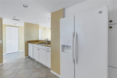 Welcome to your dream retreat in the sought-after Palma Del Mar on Isla Del Sol Yacht and Country Club in Florida - for sale on GolfHomes.com, golf home, golf lot