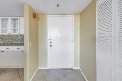 Welcome to your dream retreat in the sought-after Palma Del Mar on Isla Del Sol Yacht and Country Club in Florida - for sale on GolfHomes.com, golf home, golf lot