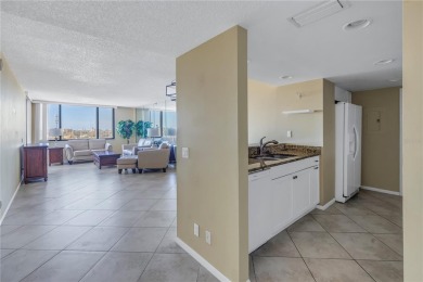 Welcome to your dream retreat in the sought-after Palma Del Mar on Isla Del Sol Yacht and Country Club in Florida - for sale on GolfHomes.com, golf home, golf lot