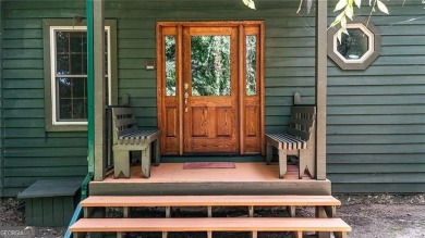 Experience ultimate privacy and breathtaking views from this on The Highlands Course at Lake Arrowhead in Georgia - for sale on GolfHomes.com, golf home, golf lot