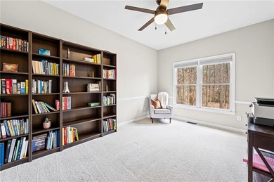 Welcome home to this 6-bedroom, 4-bath home tucked away on a on The Golf Club of Georgia in Georgia - for sale on GolfHomes.com, golf home, golf lot