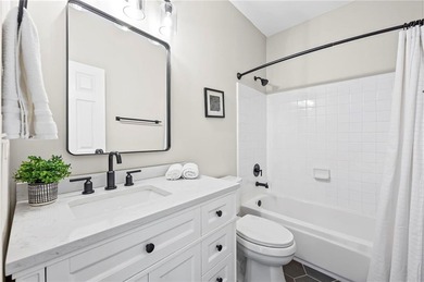 Welcome home to this 6-bedroom, 4-bath home tucked away on a on The Golf Club of Georgia in Georgia - for sale on GolfHomes.com, golf home, golf lot