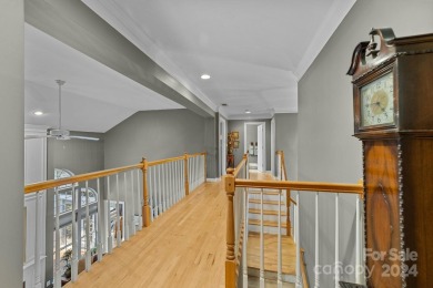 This stunning Muirfield home boasts mature trees and space for on Mooresville Golf Course in North Carolina - for sale on GolfHomes.com, golf home, golf lot