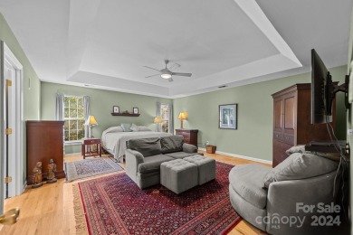 This stunning Muirfield home boasts mature trees and space for on Mooresville Golf Course in North Carolina - for sale on GolfHomes.com, golf home, golf lot