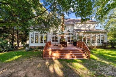 This stunning Muirfield home boasts mature trees and space for on Mooresville Golf Course in North Carolina - for sale on GolfHomes.com, golf home, golf lot