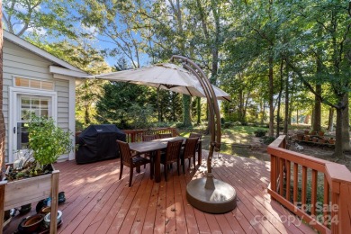 This stunning Muirfield home boasts mature trees and space for on Mooresville Golf Course in North Carolina - for sale on GolfHomes.com, golf home, golf lot