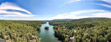 Experience ultimate privacy and breathtaking views from this on The Highlands Course at Lake Arrowhead in Georgia - for sale on GolfHomes.com, golf home, golf lot