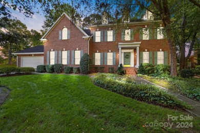 This stunning Muirfield home boasts mature trees and space for on Mooresville Golf Course in North Carolina - for sale on GolfHomes.com, golf home, golf lot