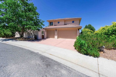 Welcome to this beautifully maintained 2-story stucco home in on Tiara Rado Golf Course in Colorado - for sale on GolfHomes.com, golf home, golf lot