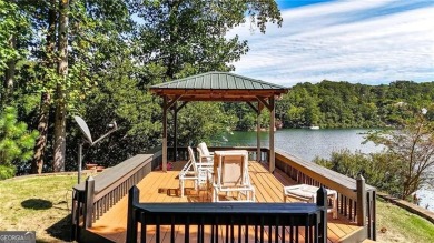 Experience ultimate privacy and breathtaking views from this on The Highlands Course at Lake Arrowhead in Georgia - for sale on GolfHomes.com, golf home, golf lot