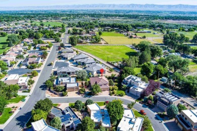Welcome to this beautifully maintained 2-story stucco home in on Tiara Rado Golf Course in Colorado - for sale on GolfHomes.com, golf home, golf lot