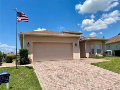 CDD BOND DEBT PAID IN FULL on this gorgeous 3 bedroom, 2 bath on Lake Ashton Golf Club in Florida - for sale on GolfHomes.com, golf home, golf lot