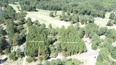 Welcome to an investor's dream! This offering includes a on Whispering Pines Golf Course in North Carolina - for sale on GolfHomes.com, golf home, golf lot