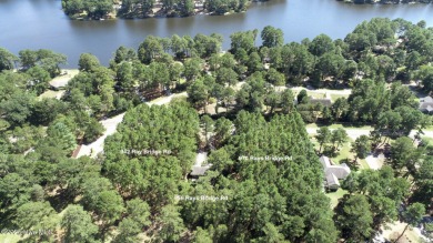 Welcome to an investor's dream! This offering includes a on Whispering Pines Golf Course in North Carolina - for sale on GolfHomes.com, golf home, golf lot