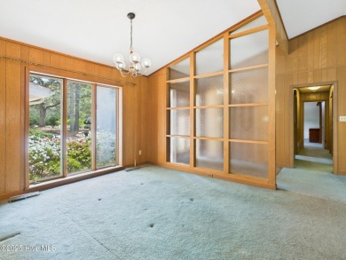 Welcome to an investor's dream! This offering includes a on Whispering Pines Golf Course in North Carolina - for sale on GolfHomes.com, golf home, golf lot