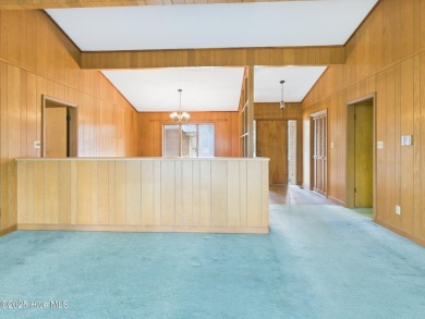 Welcome to an investor's dream! This offering includes a on Whispering Pines Golf Course in North Carolina - for sale on GolfHomes.com, golf home, golf lot