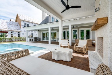 This custom Weatherly plan built by Romair Homes is situated on on Origins Golf Club in Florida - for sale on GolfHomes.com, golf home, golf lot