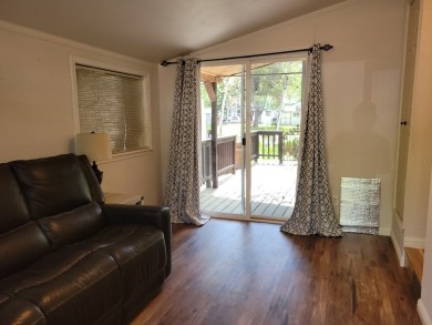 WATER VIEWS FROM YOUR LIVING ROOM!  Unusual park model; the on Cascade Golf Course in Idaho - for sale on GolfHomes.com, golf home, golf lot