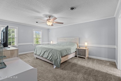 Welcome home to 4804 Burning Tree Lane North, a stately home set on Wilson Country Club in North Carolina - for sale on GolfHomes.com, golf home, golf lot