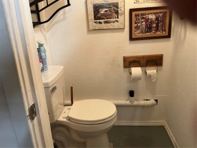 This home truly has it all! Attached RV port built to on Lily Lake Golf and RV Resort in Florida - for sale on GolfHomes.com, golf home, golf lot