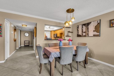 Price Improvement! Rarely available 3-bedroom corner unit in on Palm-Aire Country Club and Resort - The Oaks in Florida - for sale on GolfHomes.com, golf home, golf lot