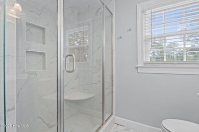 Welcome home to 4804 Burning Tree Lane North, a stately home set on Wilson Country Club in North Carolina - for sale on GolfHomes.com, golf home, golf lot