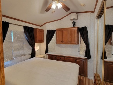 WATER VIEWS FROM YOUR LIVING ROOM!  Unusual park model; the on Cascade Golf Course in Idaho - for sale on GolfHomes.com, golf home, golf lot
