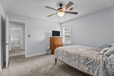 Welcome home to 4804 Burning Tree Lane North, a stately home set on Wilson Country Club in North Carolina - for sale on GolfHomes.com, golf home, golf lot