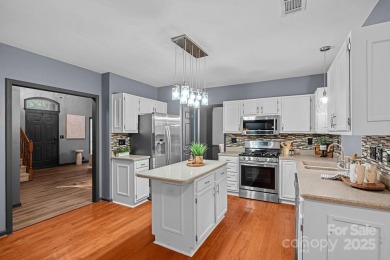Nestled in the sought-after Highland Creek golf course community on Highland Creek Golf Club in North Carolina - for sale on GolfHomes.com, golf home, golf lot
