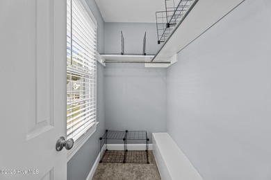 Welcome home to 4804 Burning Tree Lane North, a stately home set on Wilson Country Club in North Carolina - for sale on GolfHomes.com, golf home, golf lot