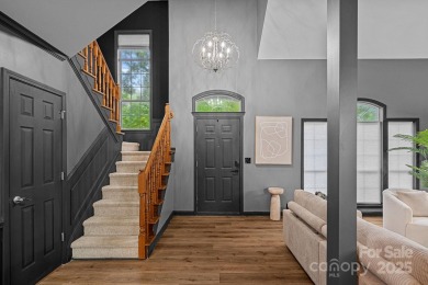 Nestled in the sought-after Highland Creek golf course community on Highland Creek Golf Club in North Carolina - for sale on GolfHomes.com, golf home, golf lot