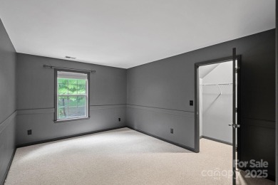 Nestled in the sought-after Highland Creek golf course community on Highland Creek Golf Club in North Carolina - for sale on GolfHomes.com, golf home, golf lot