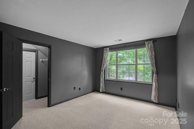 Nestled in the sought-after Highland Creek golf course community on Highland Creek Golf Club in North Carolina - for sale on GolfHomes.com, golf home, golf lot