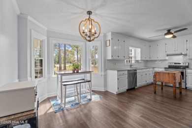 Welcome home to 4804 Burning Tree Lane North, a stately home set on Wilson Country Club in North Carolina - for sale on GolfHomes.com, golf home, golf lot