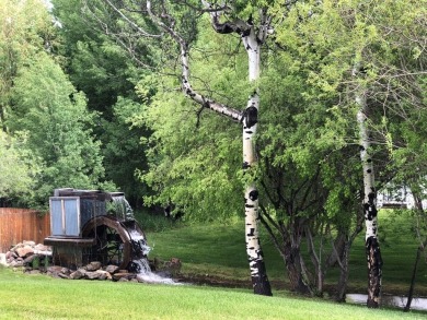 WATER VIEWS FROM YOUR LIVING ROOM!  Unusual park model; the on Cascade Golf Course in Idaho - for sale on GolfHomes.com, golf home, golf lot