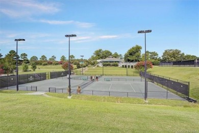 Imagine sitting on your balcony relaxing overlooking tennis on Kingsmill Resort and Golf Club in Virginia - for sale on GolfHomes.com, golf home, golf lot