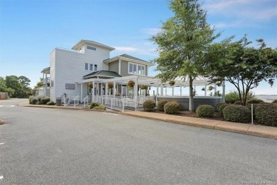 Imagine sitting on your balcony relaxing overlooking tennis on Kingsmill Resort and Golf Club in Virginia - for sale on GolfHomes.com, golf home, golf lot