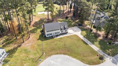 Welcome home to 4804 Burning Tree Lane North, a stately home set on Wilson Country Club in North Carolina - for sale on GolfHomes.com, golf home, golf lot