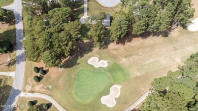 Welcome home to 4804 Burning Tree Lane North, a stately home set on Wilson Country Club in North Carolina - for sale on GolfHomes.com, golf home, golf lot