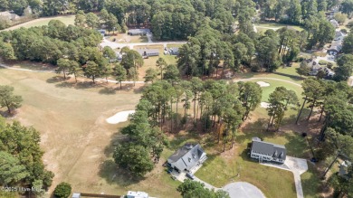 Welcome home to 4804 Burning Tree Lane North, a stately home set on Wilson Country Club in North Carolina - for sale on GolfHomes.com, golf home, golf lot