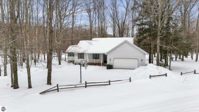 Nestled amidst four-season splendor, this home spans over 3100 on Schuss Mountain Golf Club in Michigan - for sale on GolfHomes.com, golf home, golf lot