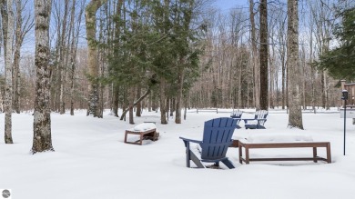 Nestled amidst four-season splendor, this home spans over 3100 on Schuss Mountain Golf Club in Michigan - for sale on GolfHomes.com, golf home, golf lot