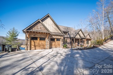 Set along the pristine shoreline of Ticoa Lake in the highly on Connestee Falls Golf Club in North Carolina - for sale on GolfHomes.com, golf home, golf lot