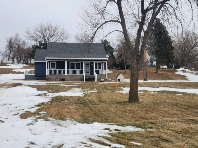 Roy Lake back lot home located on Roykota Dr. Lake City, SD with on Roy View Golf Course in South Dakota - for sale on GolfHomes.com, golf home, golf lot