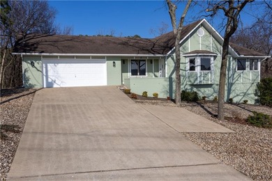 This completely remodeled 3-bedroom, 2-bath home offers modern on Bella Vista Country Club and Golf Course in Arkansas - for sale on GolfHomes.com, golf home, golf lot