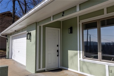 This completely remodeled 3-bedroom, 2-bath home offers modern on Bella Vista Country Club and Golf Course in Arkansas - for sale on GolfHomes.com, golf home, golf lot