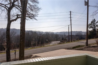 This completely remodeled 3-bedroom, 2-bath home offers modern on Bella Vista Country Club and Golf Course in Arkansas - for sale on GolfHomes.com, golf home, golf lot